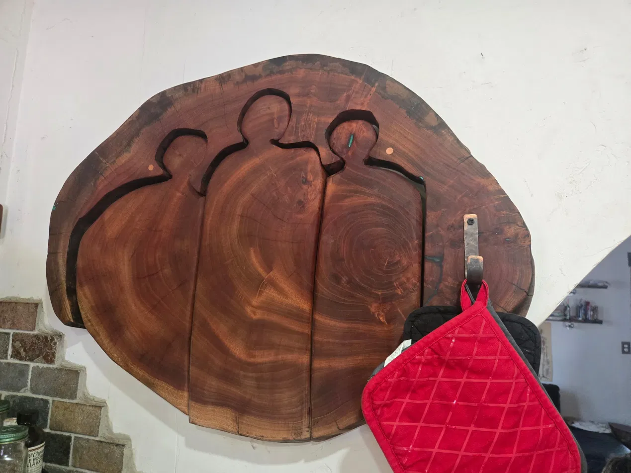 Cuban mahogany Three Figures wall piece with copper inlay